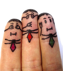 three human fingers with human figure drawings