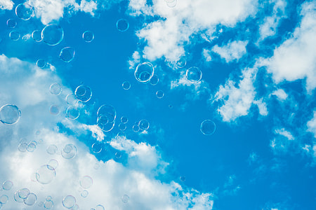Thousands of Bubbles Against Bright Blue Sky