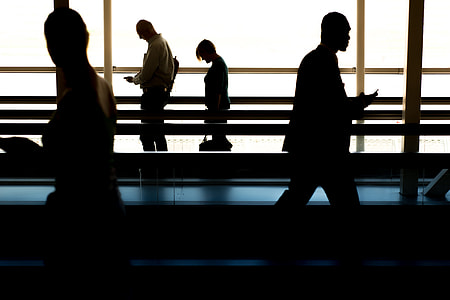 Passengers walking at airport
