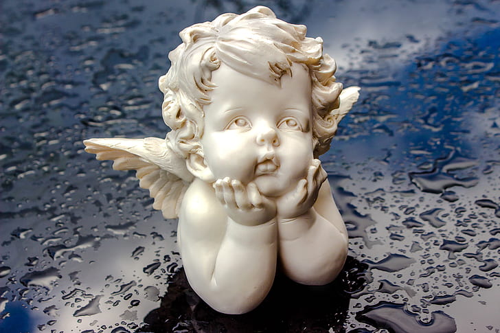 white ceramic angel head bust