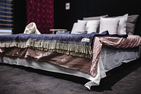 Beds with pillows on a designer exhibition