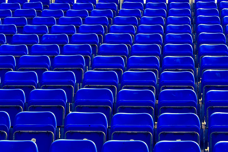 Blue seats in sports stadium