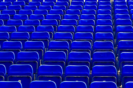 Blue seats in sports stadium