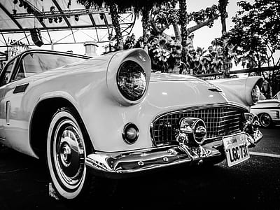 gray scale photo of vintage car