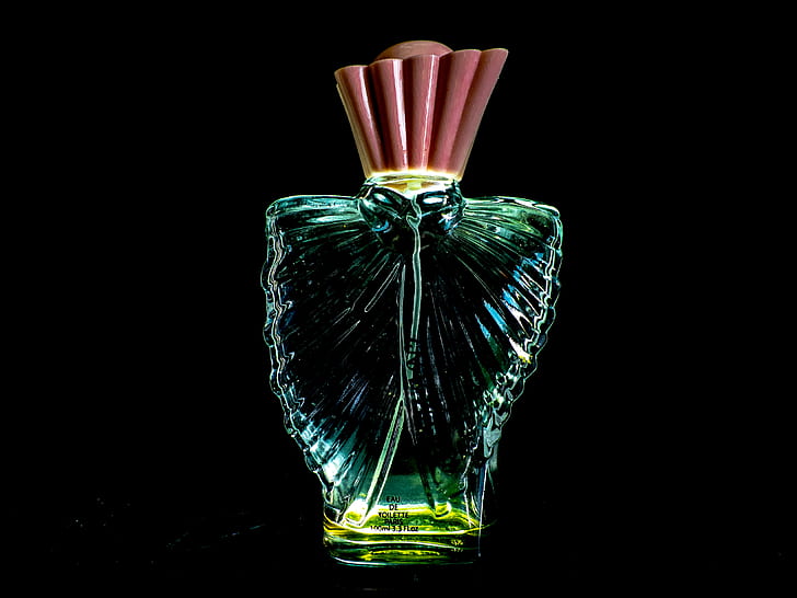 green glass perfume bottle
