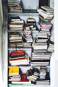 photo of file of books on cabinetr