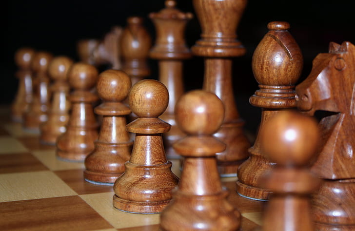 brown wooden chess set