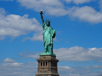 Statue of Liberty, New York below blue sky