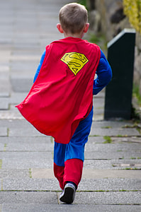 boy wearing Superman costume