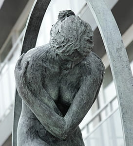 naked woman concrete statue