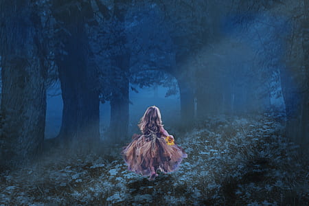 girl running in dark forest wallpaper