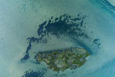 aerial blue of island during daytime