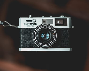 gray and black Olympus 35 RC camera