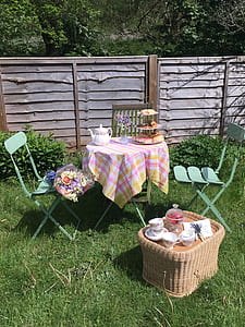 Pink and Yellow 3-piece Patio Set at the Green Grass