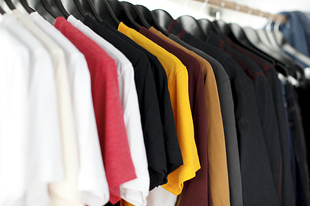 closeup photo of clothes hanging on hanger