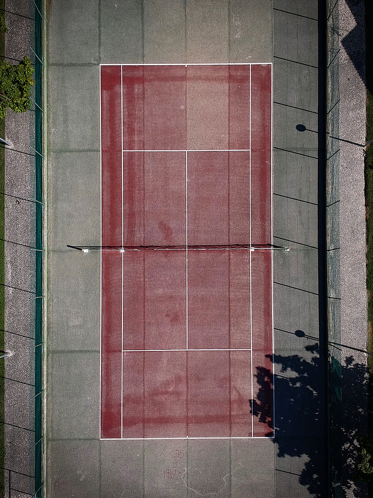 aerial view of red and grey concrete court