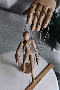 Wooden mannequin in various poses