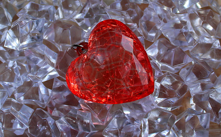 closeup photo of red heart pendant