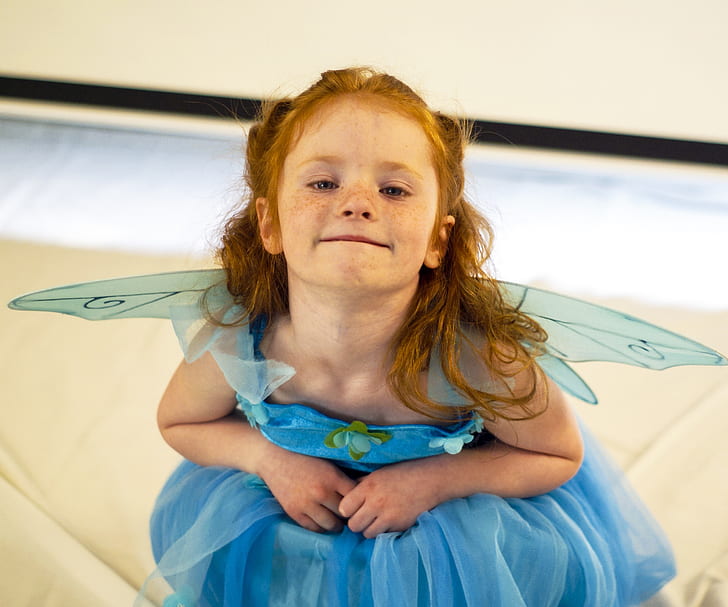 photography of girl with blue fairy costume