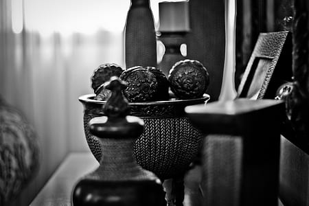 Grayscale Photography of Home Decorations Near Window