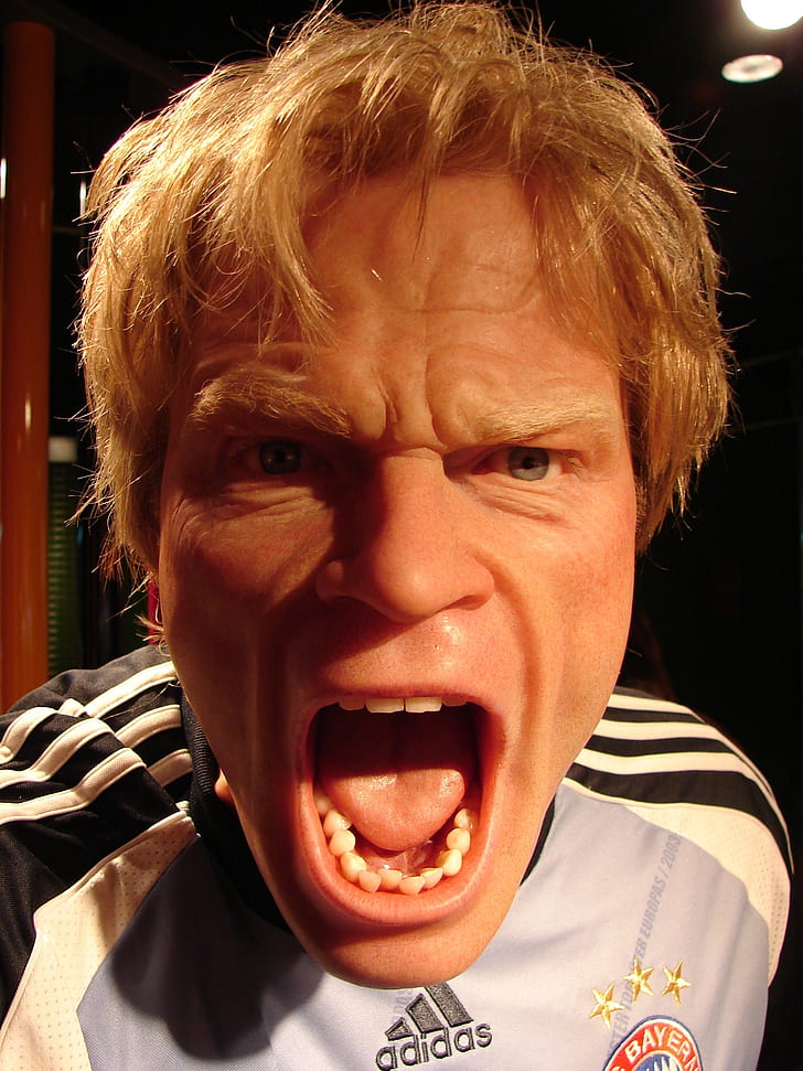 closeup photo of man wearing Adidas top open mouth