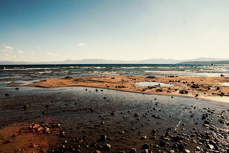 landscape photography of seashore with stones
