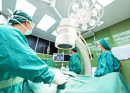 group of people in operating room