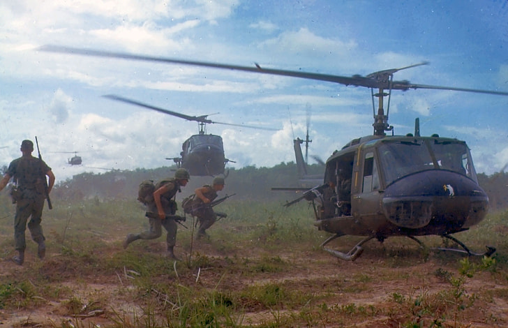 soldiers near helicopter