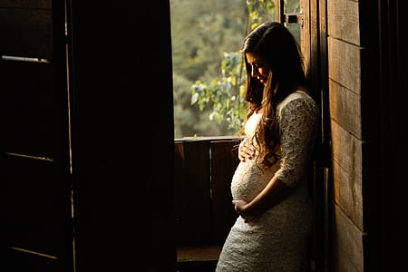 pregnant woman wearing sari dress