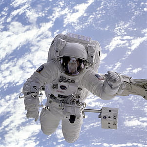 astronaut wearing NASA suit