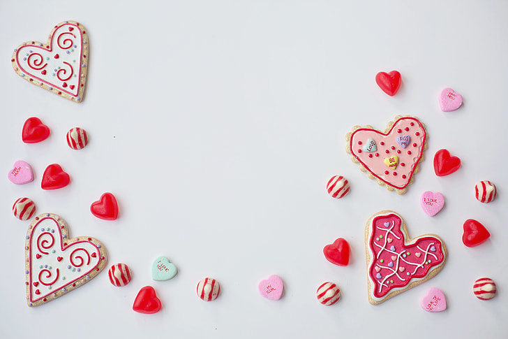 Overhead shot of love hearts and Valentine’s Day treats