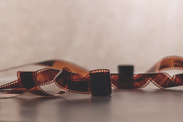 closeup photo of camera film on white surface