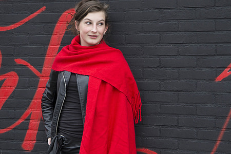 woman wearing red scarf during daytme