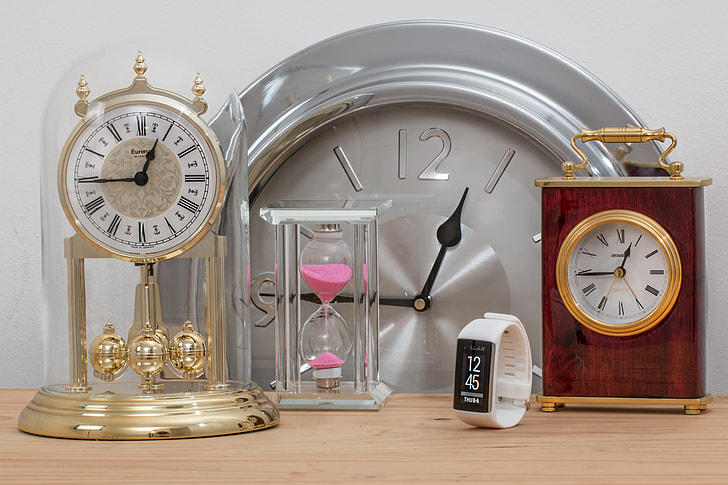 assorted-color and type of clocks