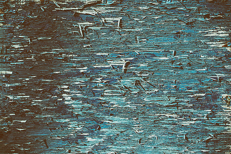 Scratched blue texture on wood
