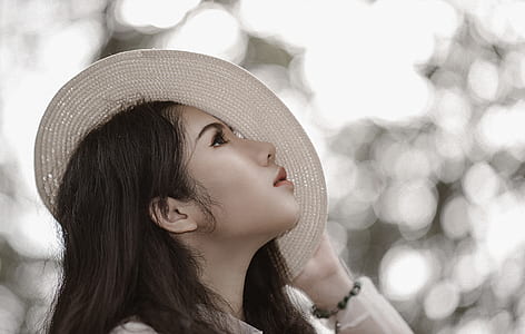 Woman Wearing White Hat See in the Sky