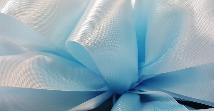 close up photo of blue ribbon