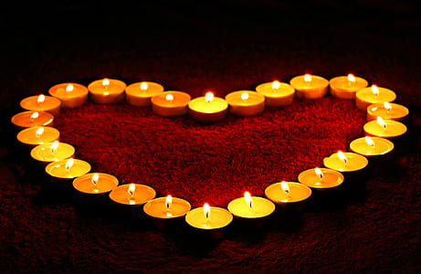 heart formed lighted tealight candles