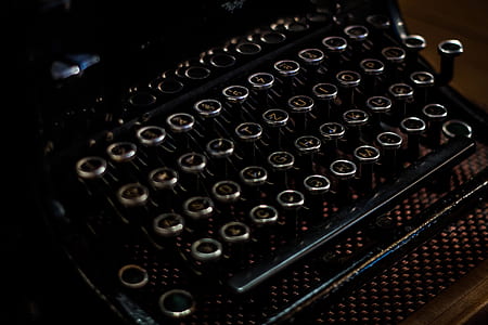 closeup photo of gray typewriter