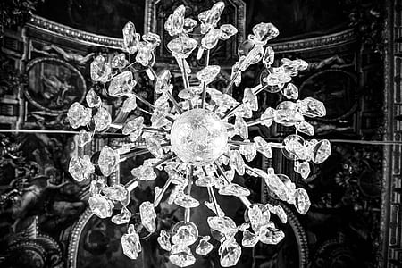 grayscale photography of crystal stone chandelier