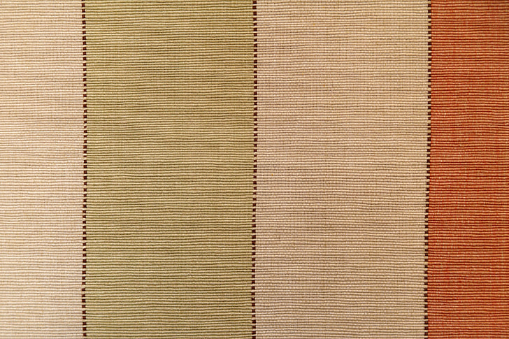 brown, black, and orange stripe textile