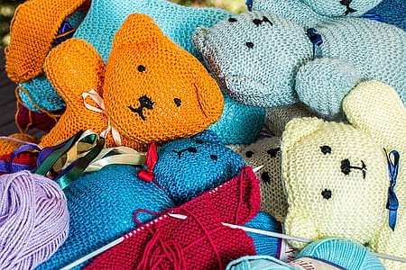 assorted-color bear amigurumi knitted dolls