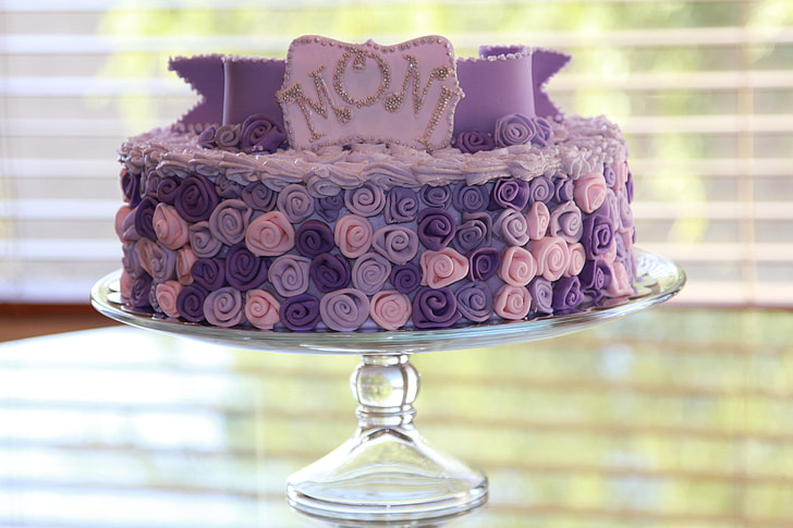 purple fondant came with flower accent on glass tray