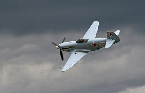 white fighter plane