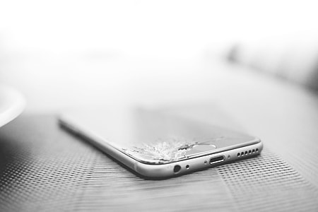 Minimalistic Crashed iPhone with Cracked Screen