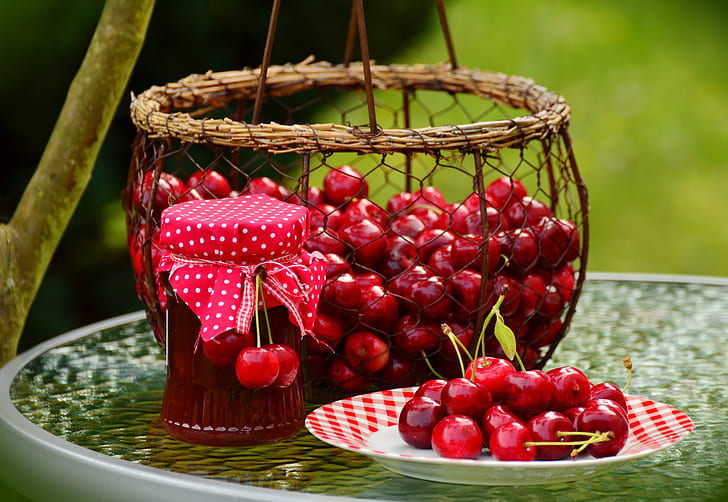 red cherries on baskets