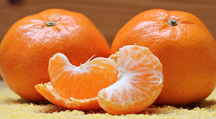 two orange fruits