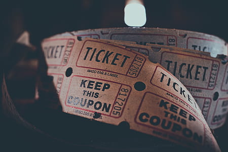 close up photography of ticket coupons