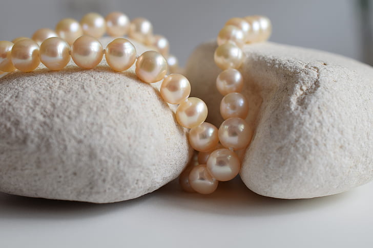 beaded pearl accessory on stones