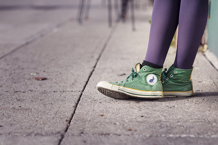 green Converse high-top sneakers